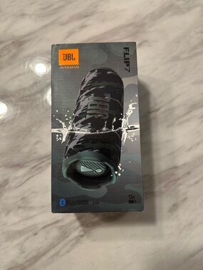 JBL Flip 7 Portable Bluetooth Speaker - Black with Teal Accents